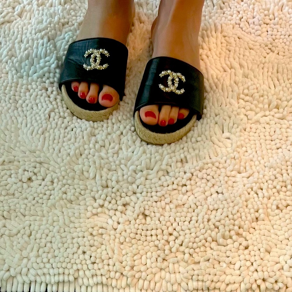 Authentic Chanel Lambskin Black Espadrille slides with pearl CC detail.